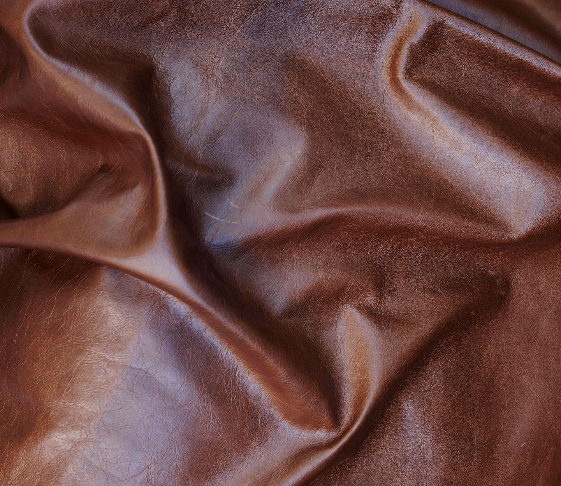 cowhide leather vs calf leather Afrouz